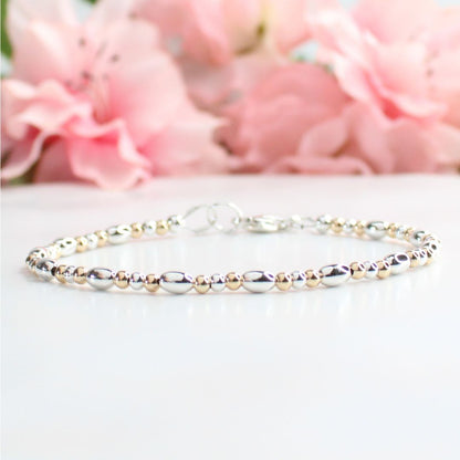 Silver Bead Bracelet Gold Accent Beads - Resilience